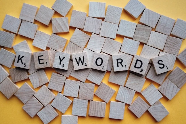 Wooden blocks spelling keywords for SEO and search optimization.