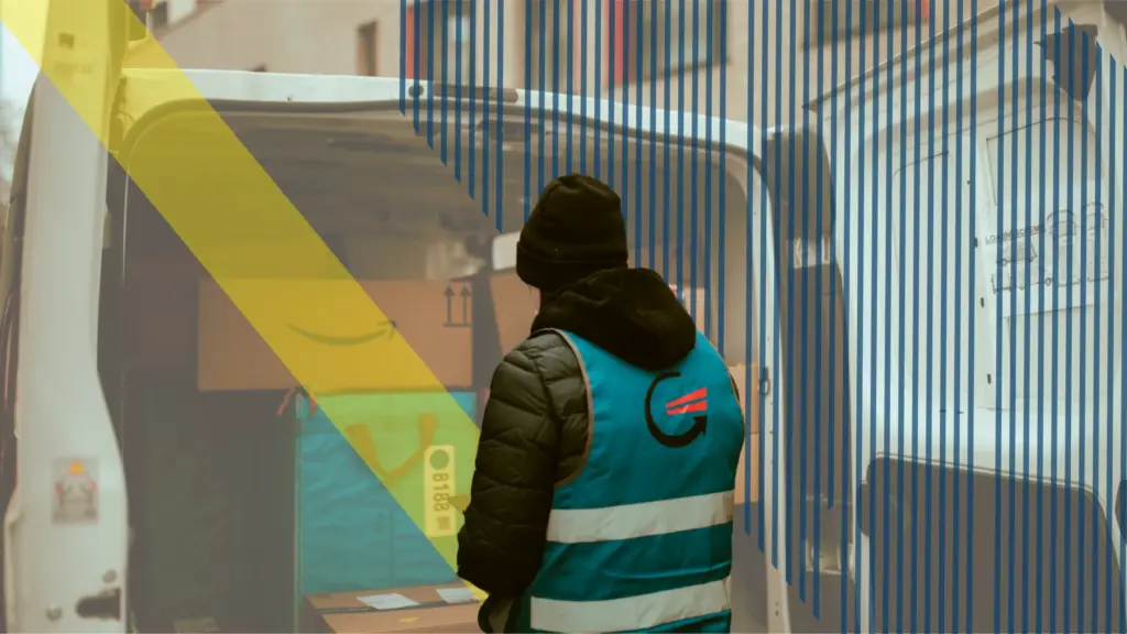 Amazon FBA delivery worker handling packages.
