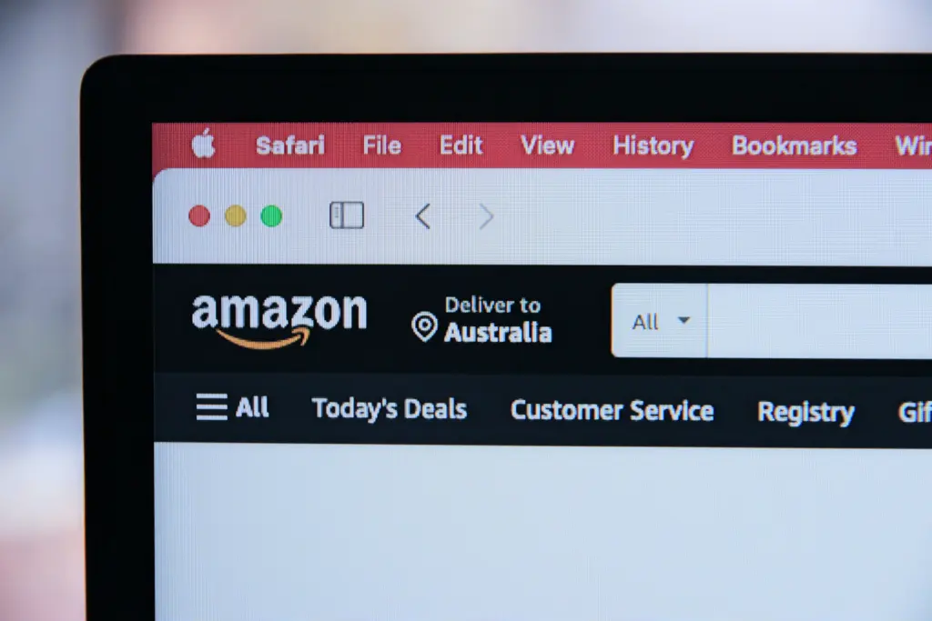 Amazon website on laptop screen showing online shopping.